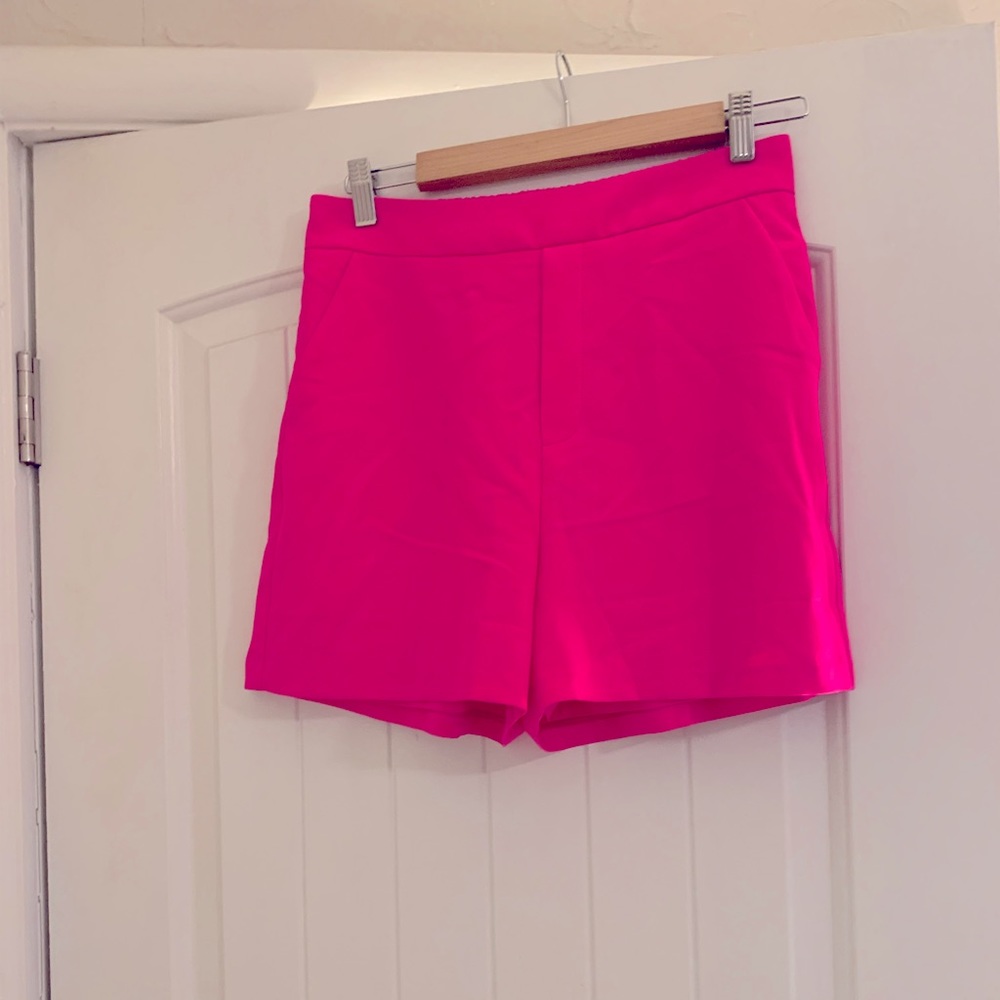 Nicely made hot pink “business” shorts